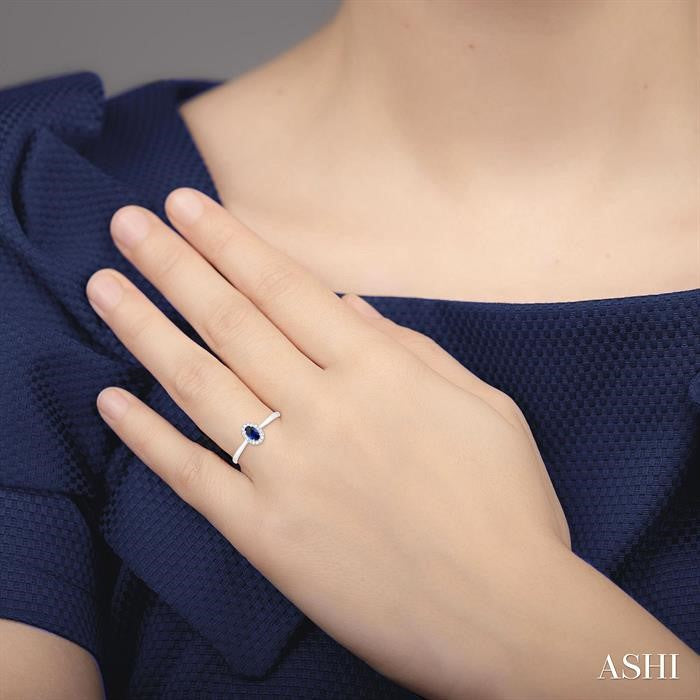 Oval Shape Sapphire & Halo Diamond Ring