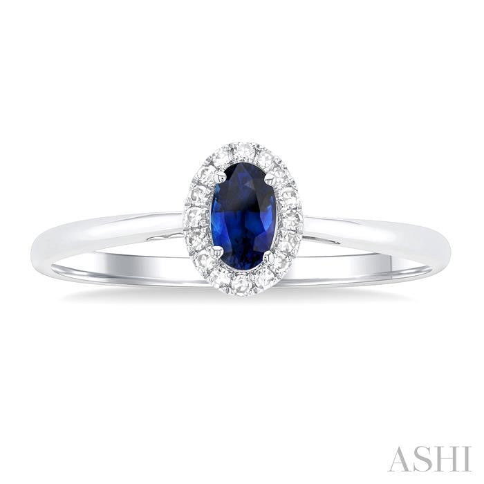 Oval Shape Sapphire & Halo Diamond Ring